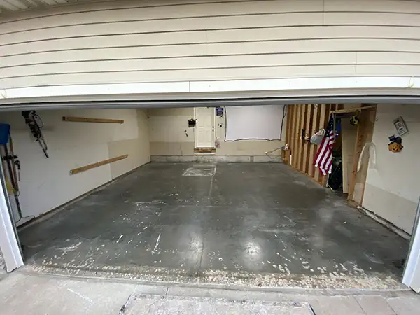 Old stained garage concrete before coating