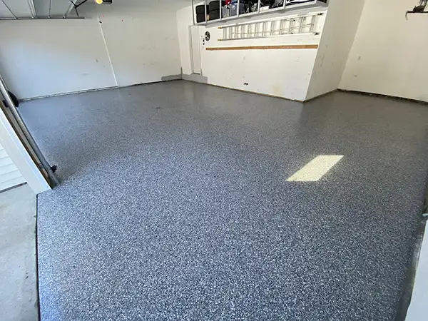 Garage floor after polyurea flake coating — Panther Coatings project 5