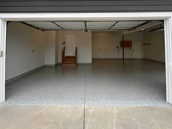 Finished garage floor after polyurea flake coating — Panther Coatings