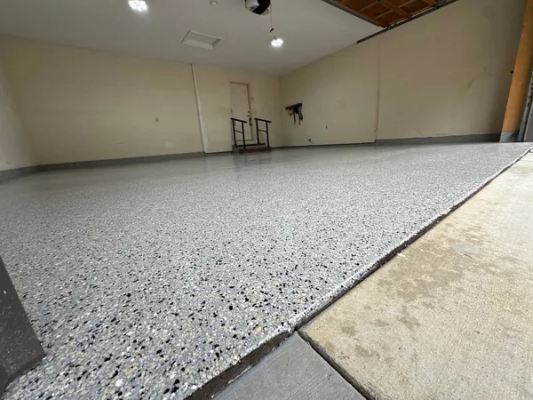 Garage floor after polyurea flake coating — Panther Coatings project 7