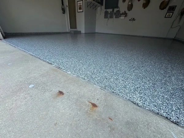 Garage floor after polyurea flake coating — Panther Coatings project 8