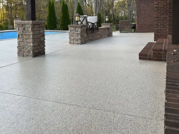 Porch after polyaspartic flake system — Panther Coatings