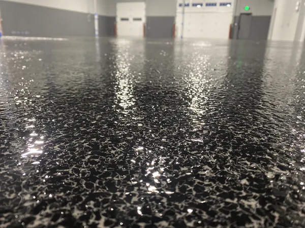 Premium polyurea concrete coating with high-gloss finish — Panther Coatings